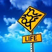 14199329-sign-concept-symbolizing-life-is-full-of-twists-and-turns-with-a-sky-background