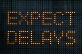6902521-urban-traffic-congestion-sign-saying-expect-delays