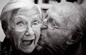 old couple smack on the cheek